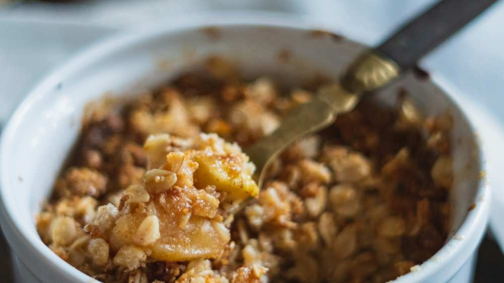 Should you cook apples before making a crumble?