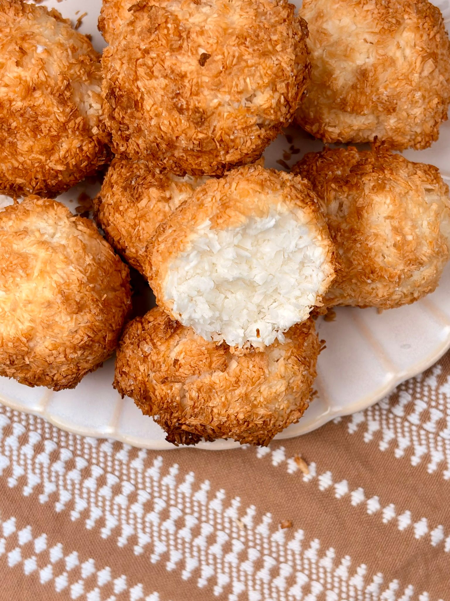 Golden-brown coconut macaroons (Rochers Coco) with a slightly crispy exterior and moist interior.